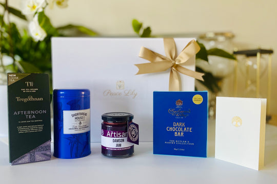 Peace Lily Gift Box Hamper Tea Break with British tea, Scottish Shortbread, Gloucestershire Jam, Charbonnel et Walker Dark Chocolate Bar, Greeting Card and Gift Box with Ribbon